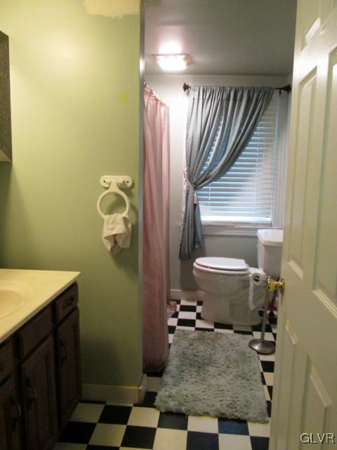 2208 Hillside Road Slatington, PA 18080 - Photo 5 of 10 a bathroom with a sink toilet and shower