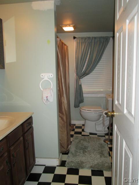 2208 Hillside Road Slatington, PA 18080 - Photo 6 of 10 a bathroom with a sink toilet and shower