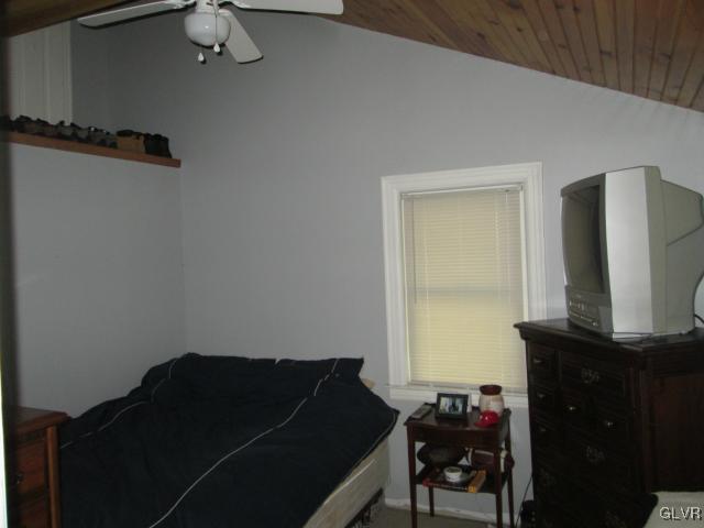 2208 Hillside Road Slatington, PA 18080 - Photo 8 of 10 a room with a bed and a mirror