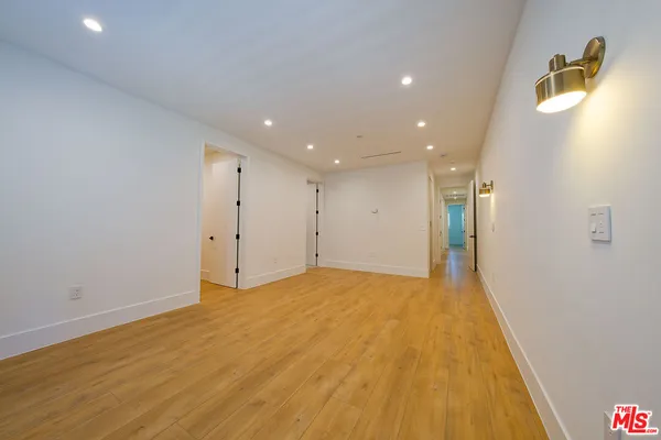 a view of an empty walk in closet