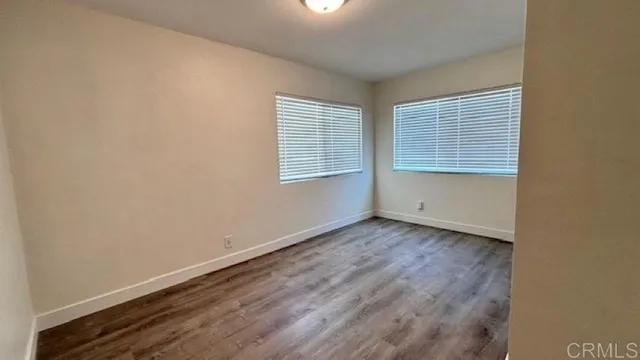 a view of a room that has a window in it