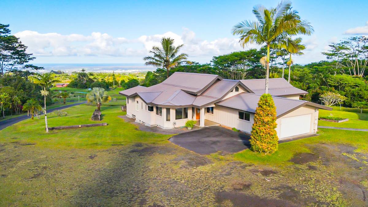 370 Akolea Road Hilo, HI 96720 - Photo 1 of 29 a view of a house with a big yard