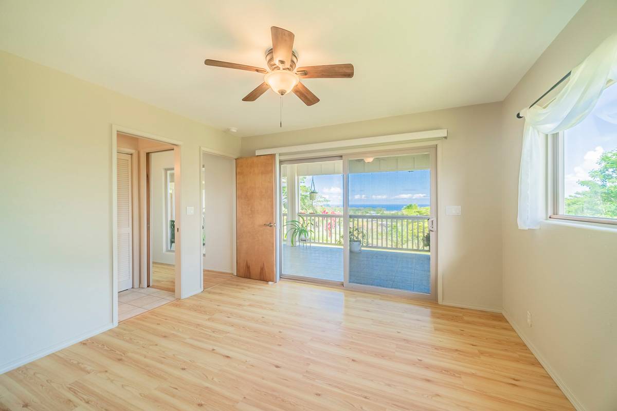 370 Akolea Road Hilo, HI 96720 - Photo 17 of 29 a view of an empty room with a window
