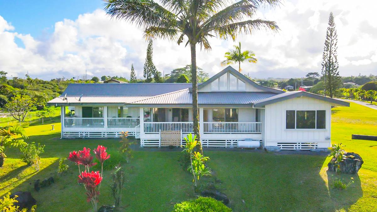 370 Akolea Road Hilo, HI 96720 - Photo 27 of 29 a front view of a house with garden