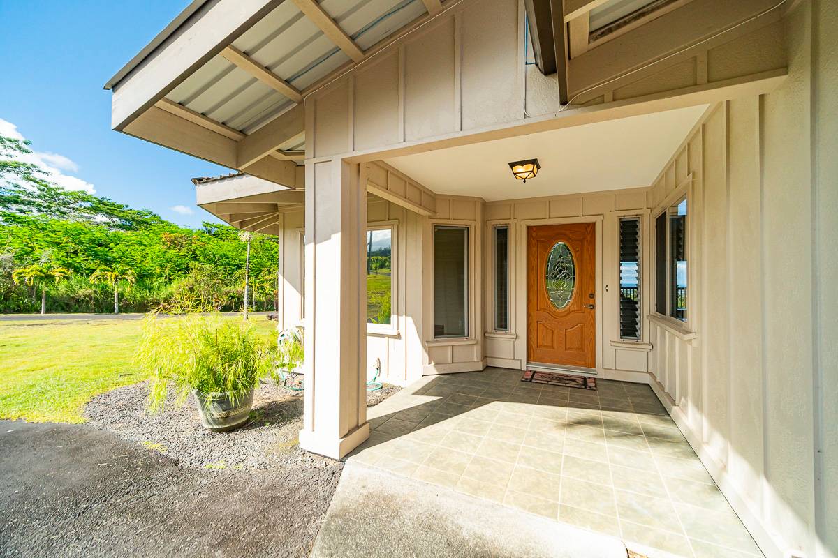 370 Akolea Road Hilo, HI 96720 - Photo 4 of 29 a view of a entryway door front of house