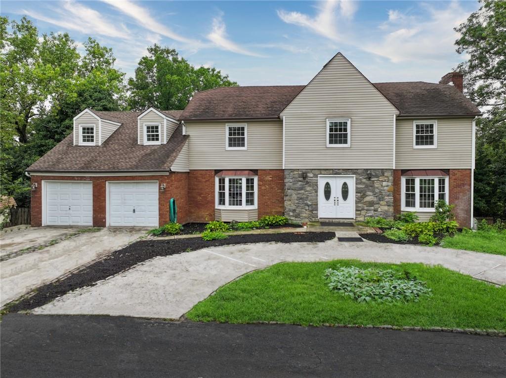 View of front of house with a garage