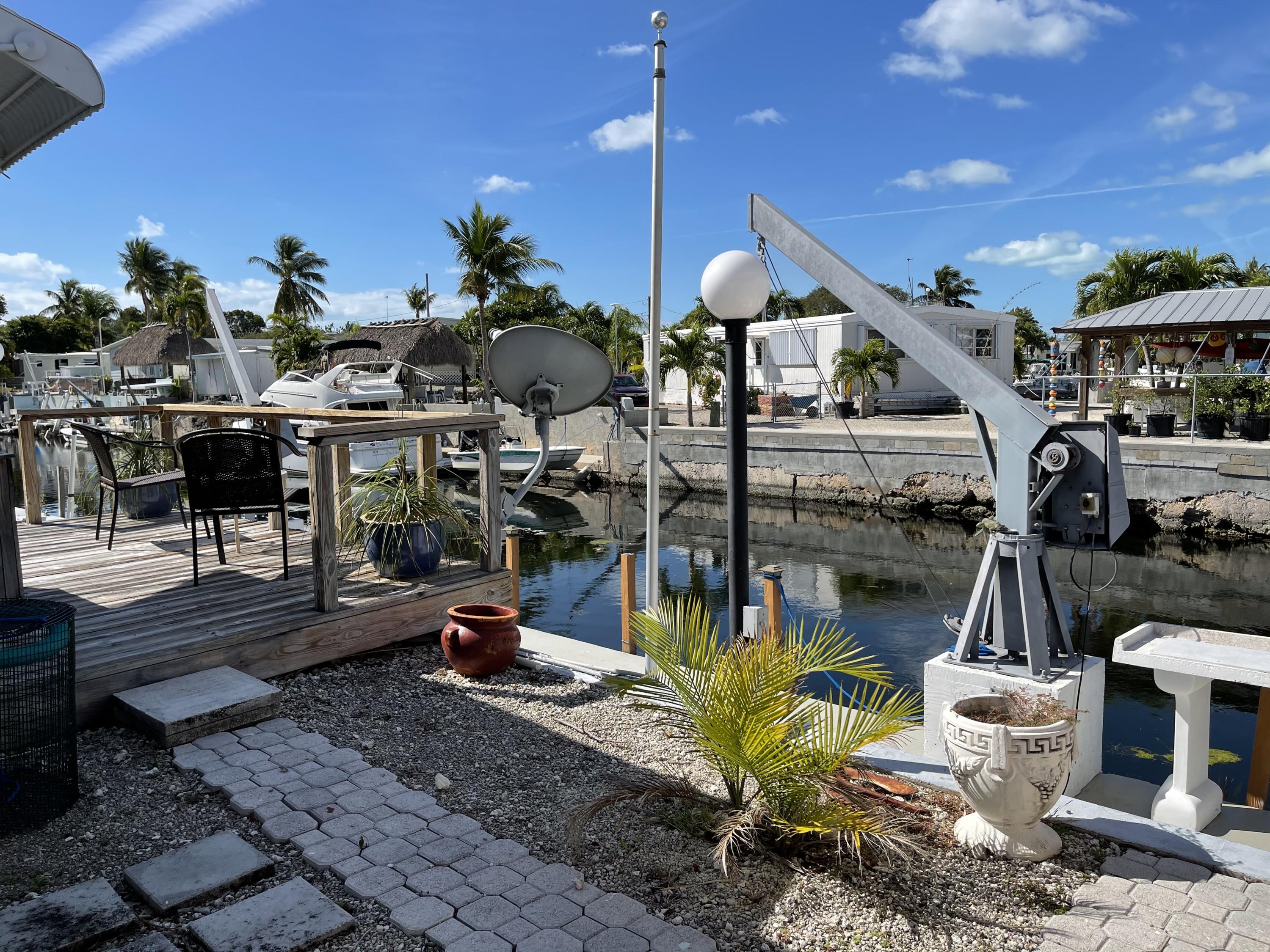 1107 Calder Road Key Largo, FL 33037 - Photo 5 of 46 concrete dock davits