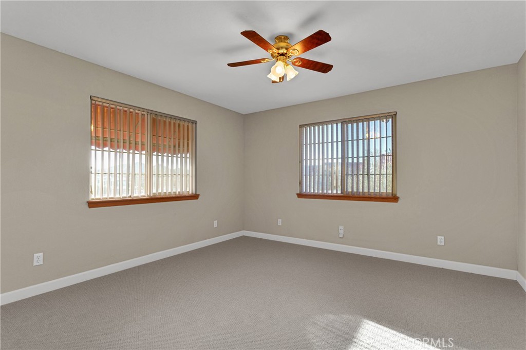16620 Iwa Road Apple Valley, CA 92307 - Photo 24 of 50 an empty room with a window