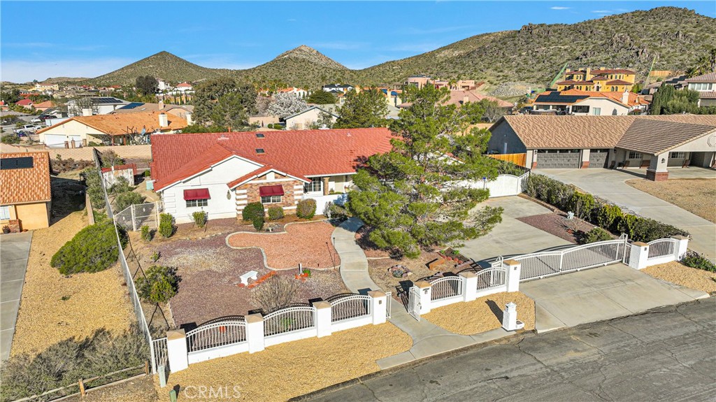 16620 Iwa Road Apple Valley, CA 92307 - Photo 48 of 50 an aerial view of a house with a mountain