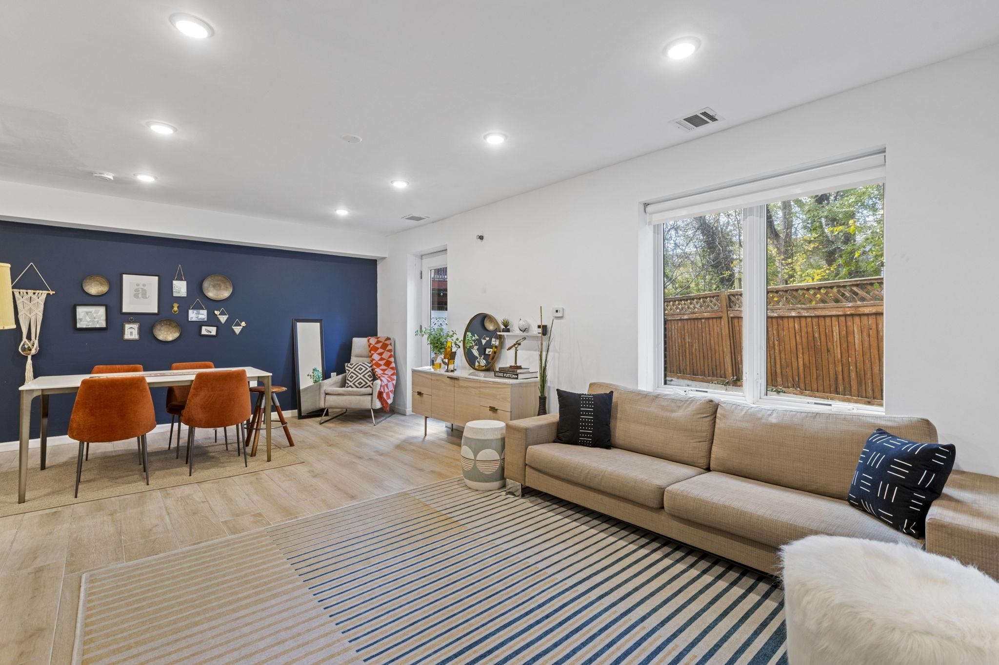 27 Hackensack Plank Road, Unit 1 Weehawken, NJ 07086 - Photo 19 of 23 a living room with furniture and a table