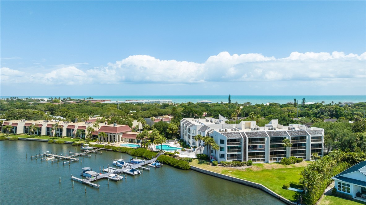 5101 Florida A1A, Unit 108 Vero Beach, FL 32963 - Photo 25 of 31 a view of a lake with a city