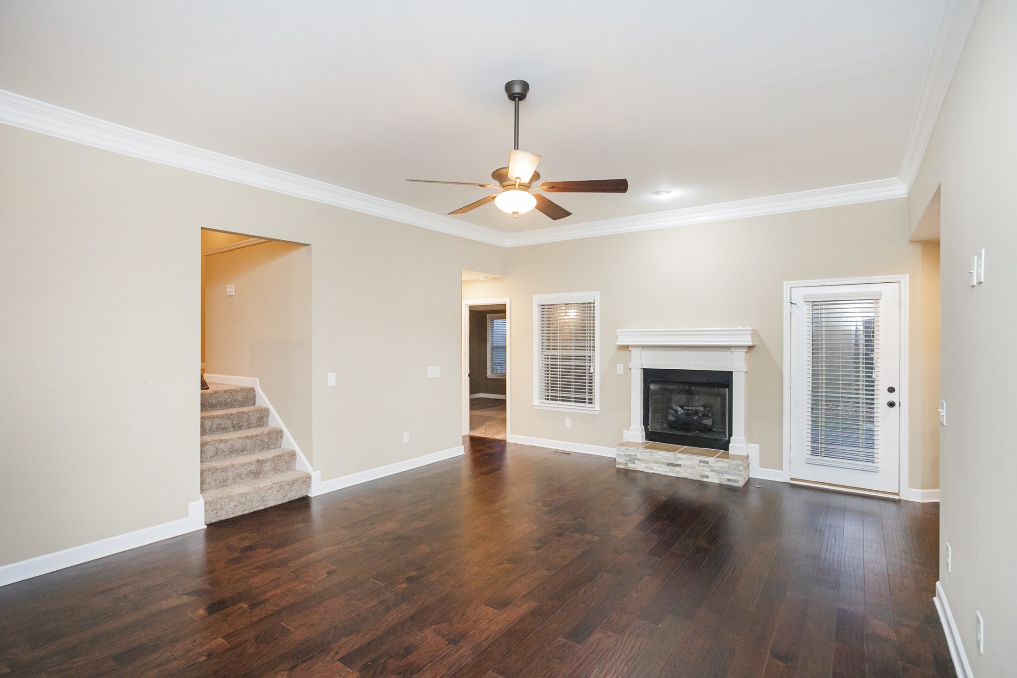 31 Remington Road Lebanon, TN 37090 - Photo 11 of 50 a view of an empty room with wooden floor fireplace and a window
