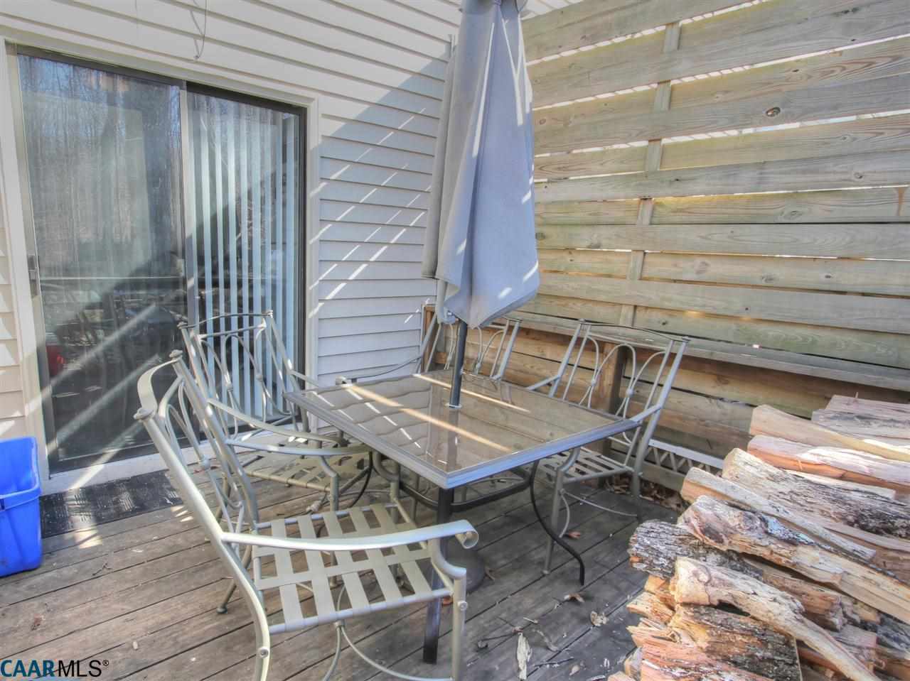 310 Westfield Road Charlottesville, VA 22901 - Photo 9 of 19 a balcony with table and chairs