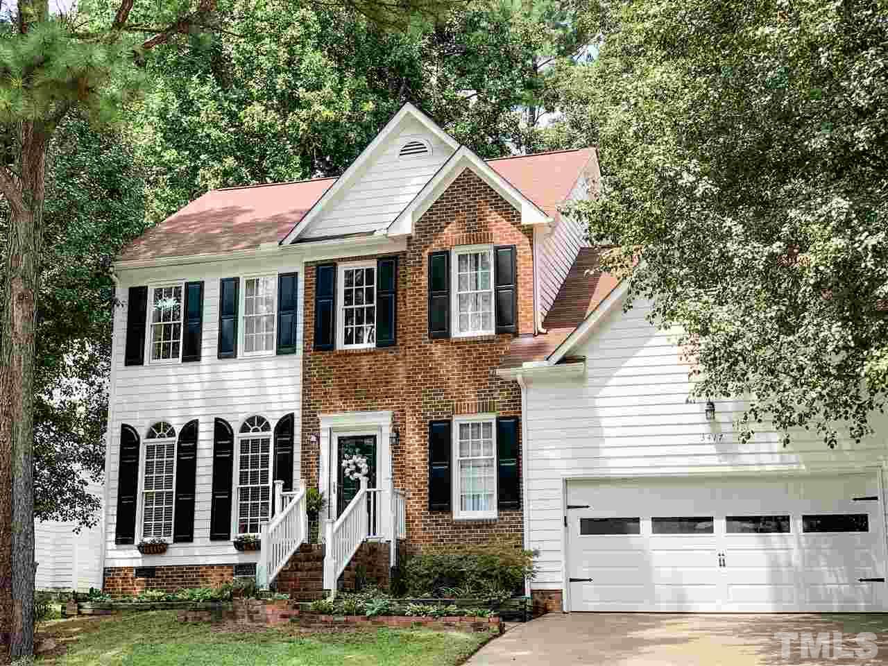 3417 Tunas Street Raleigh, NC 27616 - Photo 1 of 30 a front view of a house with a yard and garage