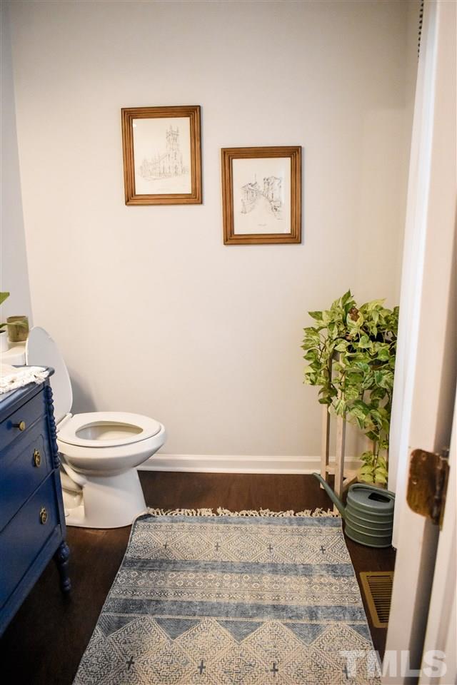 3417 Tunas Street Raleigh, NC 27616 - Photo 4 of 30 a bathroom with a toilet and a shower