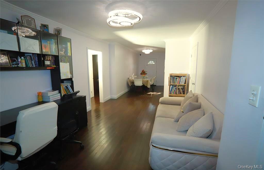 71-38 147th Street, Unit 27A Queens, NY 11367 - Photo 4 of 8 Office featuring crown molding and dark wood-type flooring