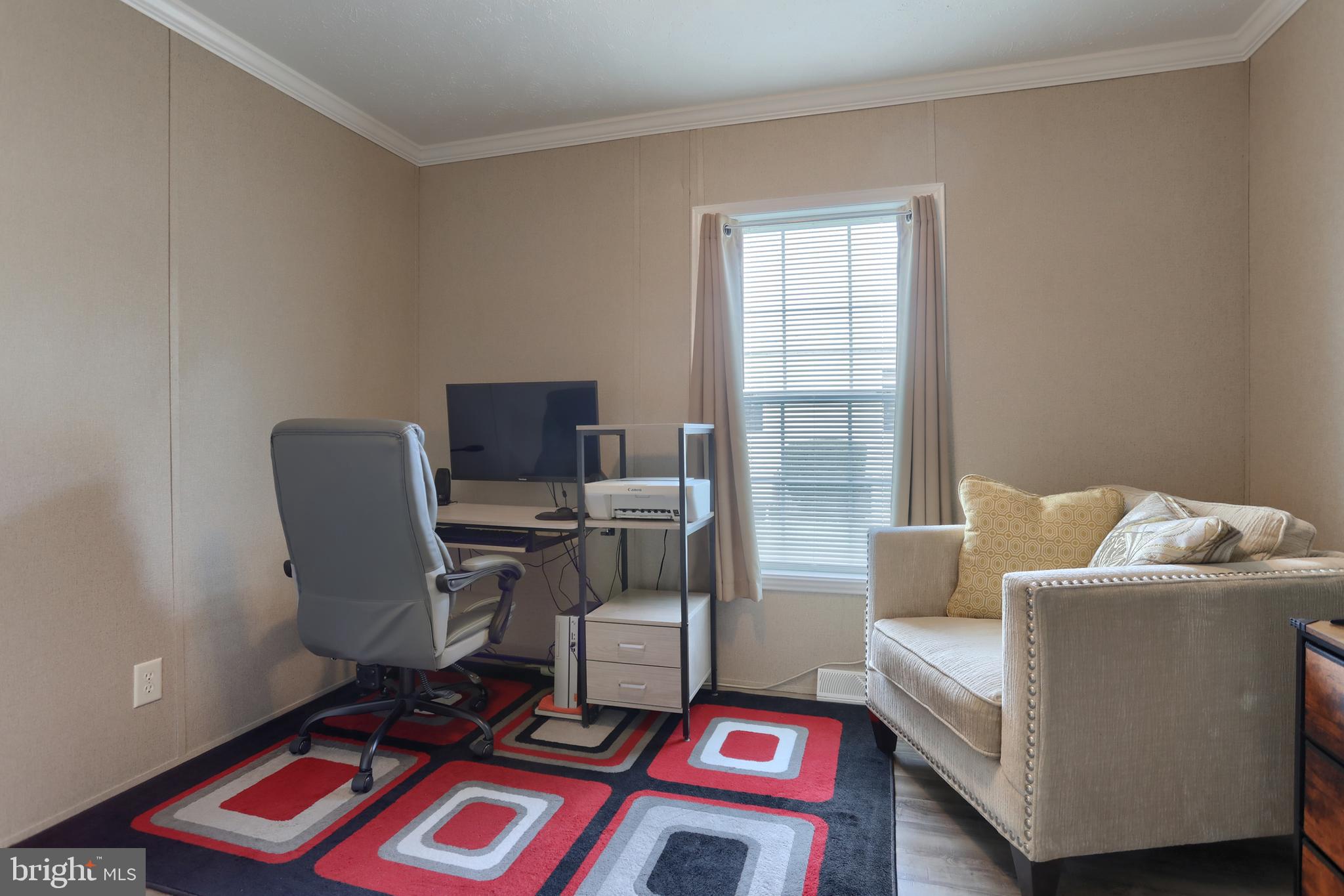 1300 East Kercher Avenue, Unit 32 Myerstown, PA 17067 - Photo 12 of 27 a living room with furniture and a window