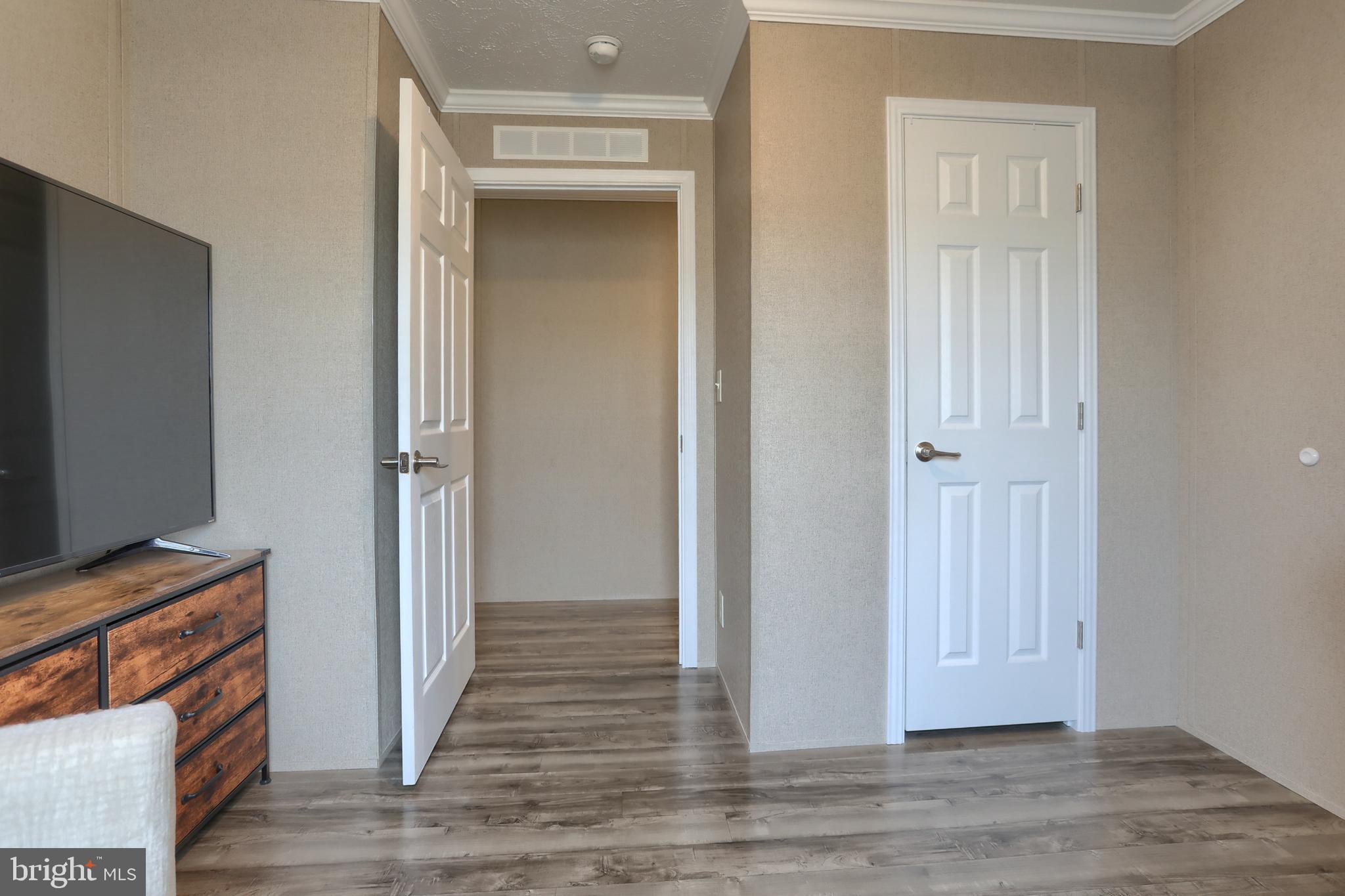 1300 East Kercher Avenue, Unit 32 Myerstown, PA 17067 - Photo 13 of 27 a view of a hallway with wooden floor and closet
