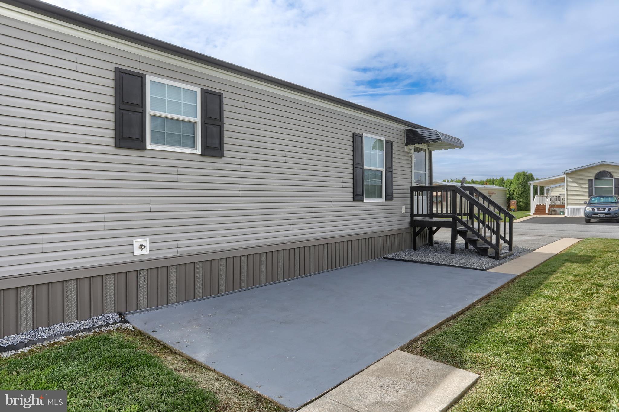 1300 East Kercher Avenue, Unit 32 Myerstown, PA 17067 - Photo 24 of 27 a view of backyard with deck and seating space