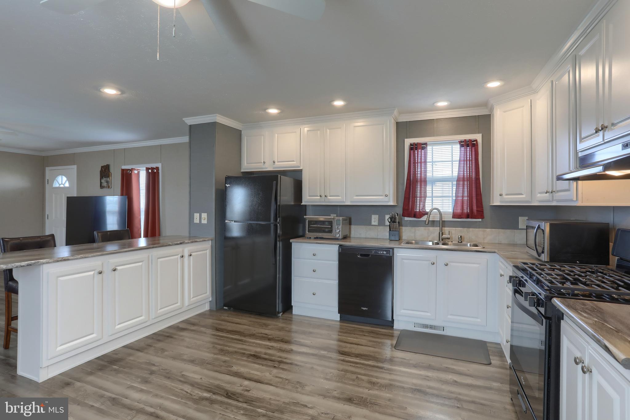 1300 East Kercher Avenue, Unit 32 Myerstown, PA 17067 - Photo 9 of 27 a kitchen with a refrigerator stove top oven and sink