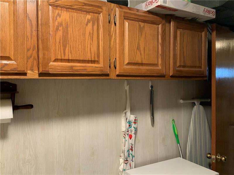 274 Malone Ridge Road Washington, PA 15301 - Photo 25 of 25 Storage Cabinets in Laundry Room