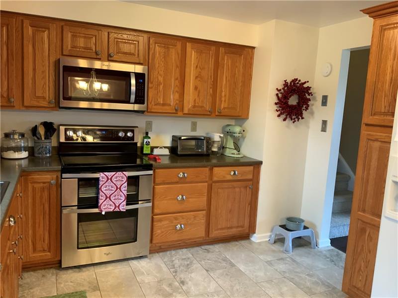 274 Malone Ridge Road Washington, PA 15301 - Photo 7 of 25 New Stove, Microwave & Ceramic Flooring in Spacious Kitchen