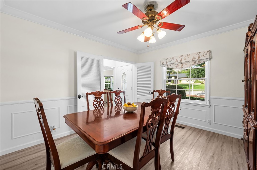 5487 Cadbury Road Whittier, CA 90601 - Photo 13 of 73 a view of a dining room with furniture window and wooden floor
