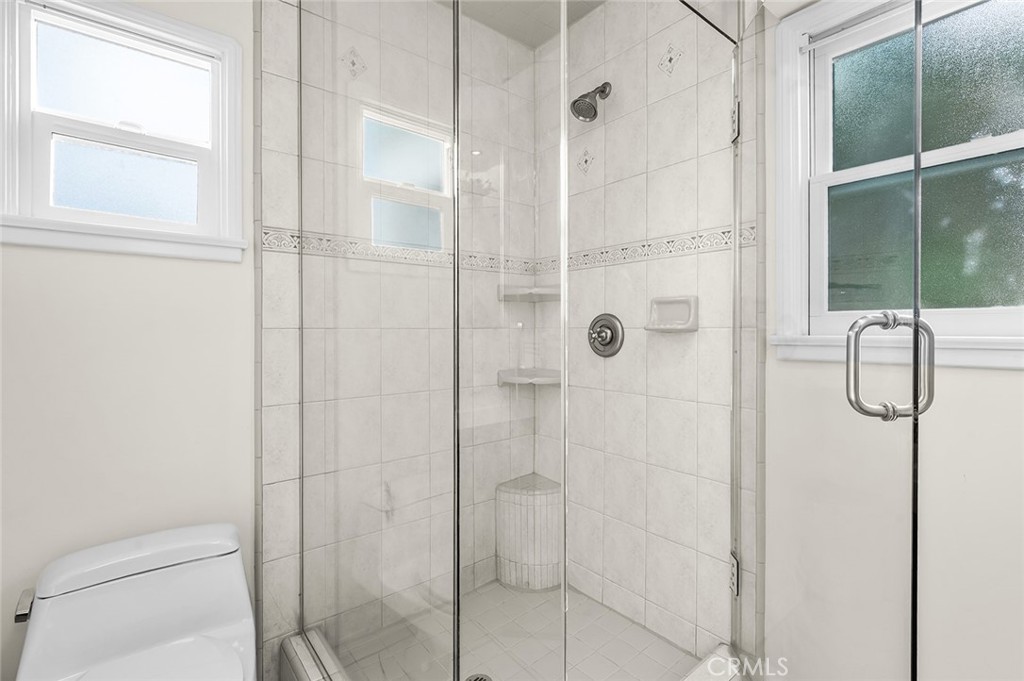 5487 Cadbury Road Whittier, CA 90601 - Photo 23 of 73 a bathroom with a shower