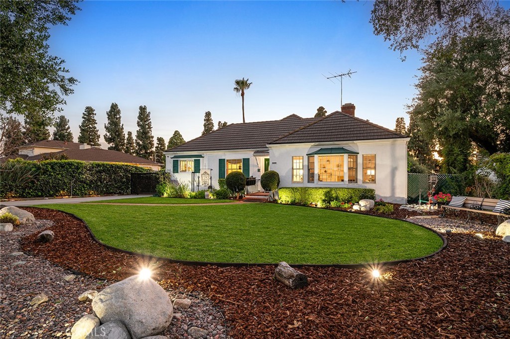 5487 Cadbury Road Whittier, CA 90601 - Photo 3 of 73 a front view of a house with a yard