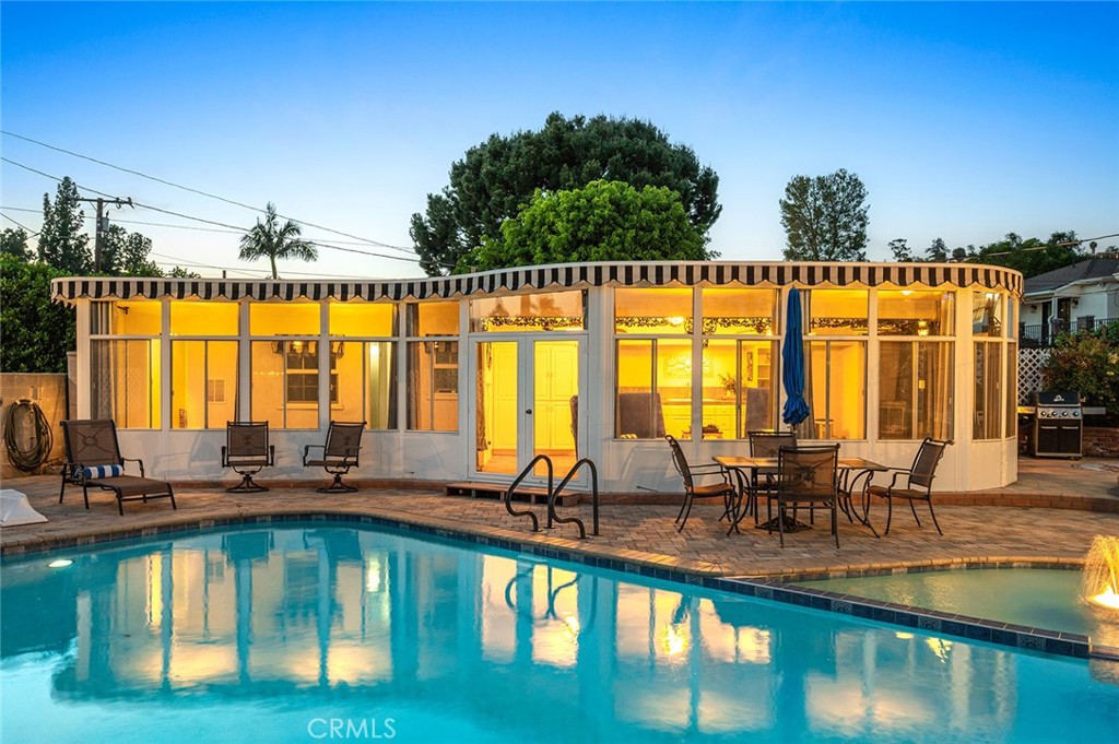 5487 Cadbury Road Whittier, CA 90601 - Photo 42 of 73 a view of a swimming pool with outdoor seating