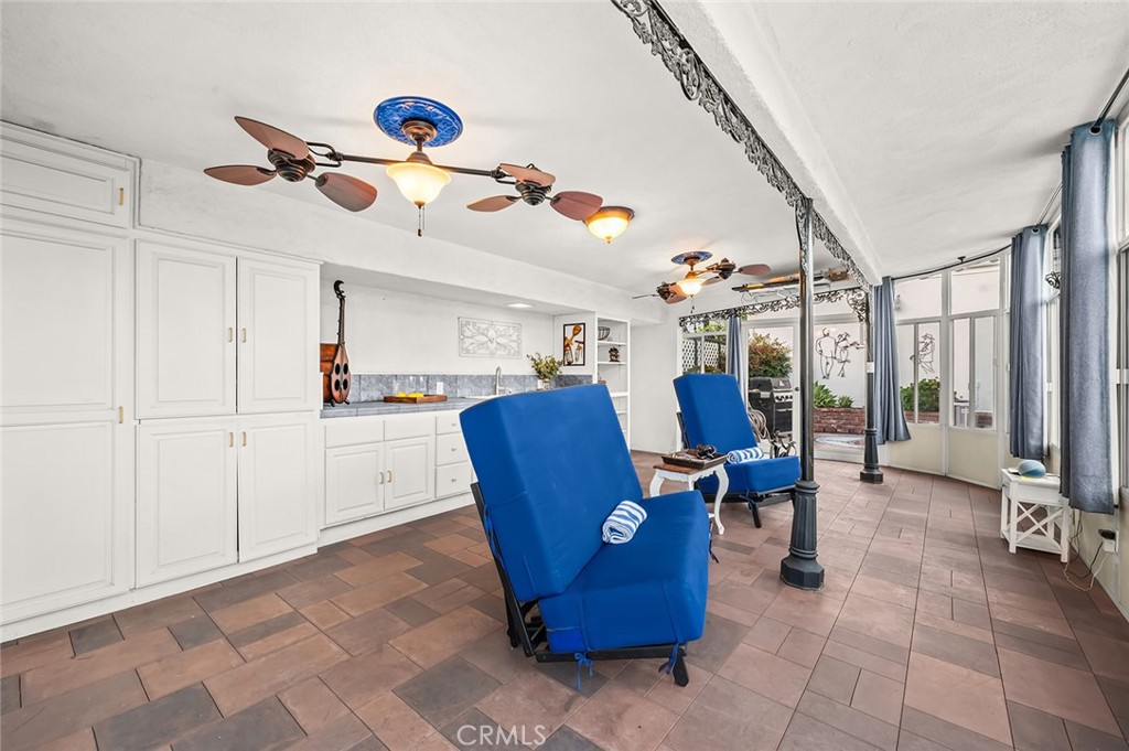 5487 Cadbury Road Whittier, CA 90601 - Photo 45 of 73 a view of a dining area with furniture and a chandelier