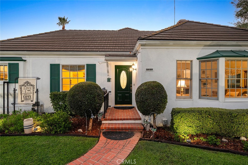 5487 Cadbury Road Whittier, CA 90601 - Photo 5 of 73 a front view of a house with garden