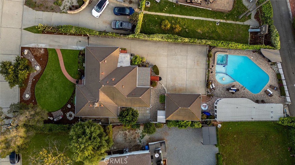 5487 Cadbury Road Whittier, CA 90601 - Photo 67 of 73 an aerial view of a house with a pool and a yard