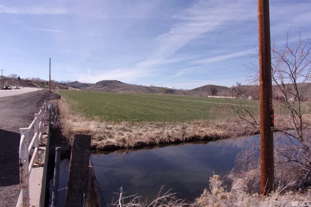 a view of a lake with a mountain in the background