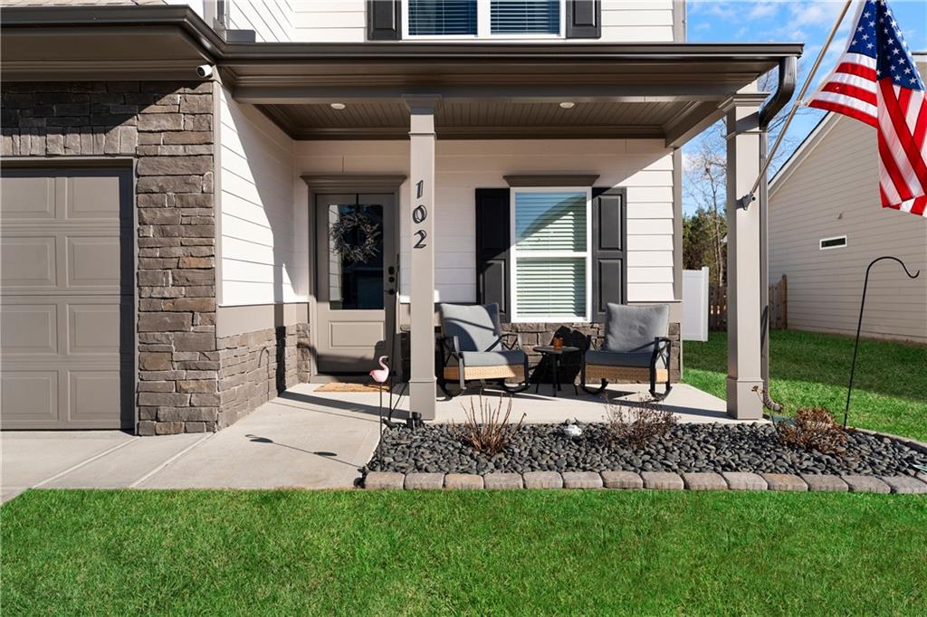 102 Royal Oak Drive Northeast Rome, GA 30165 - Photo 3 of 41 a view of house with backyard and outdoor seating