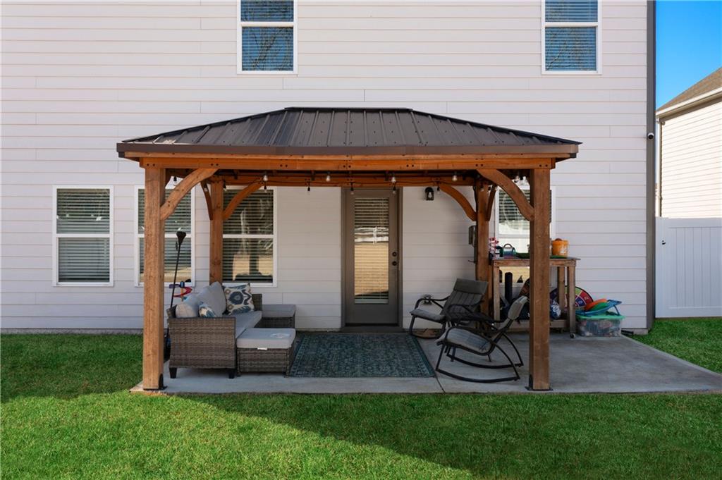 102 Royal Oak Drive Northeast Rome, GA 30165 - Photo 37 of 41 a front view of a house with patio