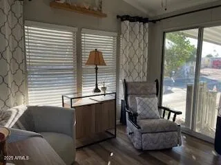 a living room with furniture and a window