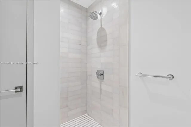 a view of a room with a floor to ceiling window