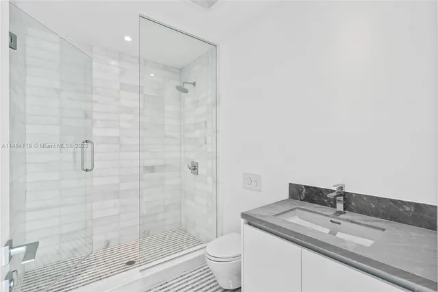 a view of an empty room with a glass door