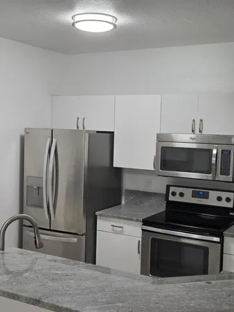 $195,000 | 164 Southwest Peacock Boulevard, Unit 102, Port St. Lucie, FL 34986