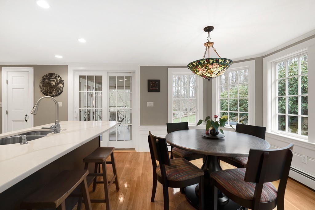 32 Cunningham Road Wellesley, MA 02481 - Photo 13 of 30 a dining room with furniture a chandelier and window