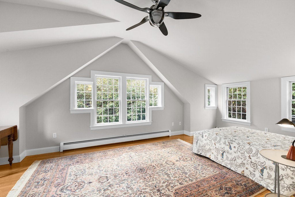 32 Cunningham Road Wellesley, MA 02481 - Photo 20 of 30 a bedroom with a bed and a window