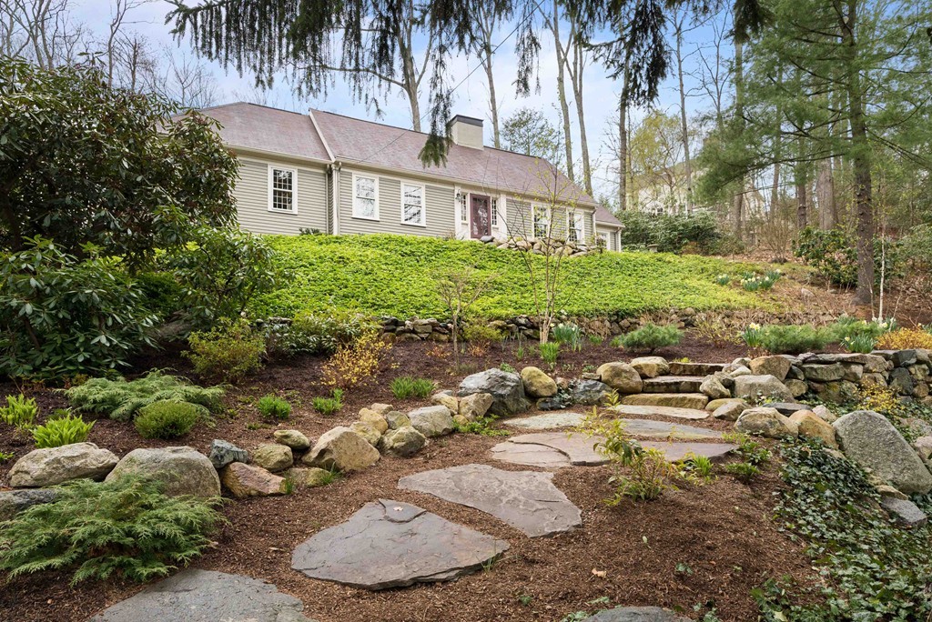 32 Cunningham Road Wellesley, MA 02481 - Photo 3 of 30 a view of a house with a yard and plant