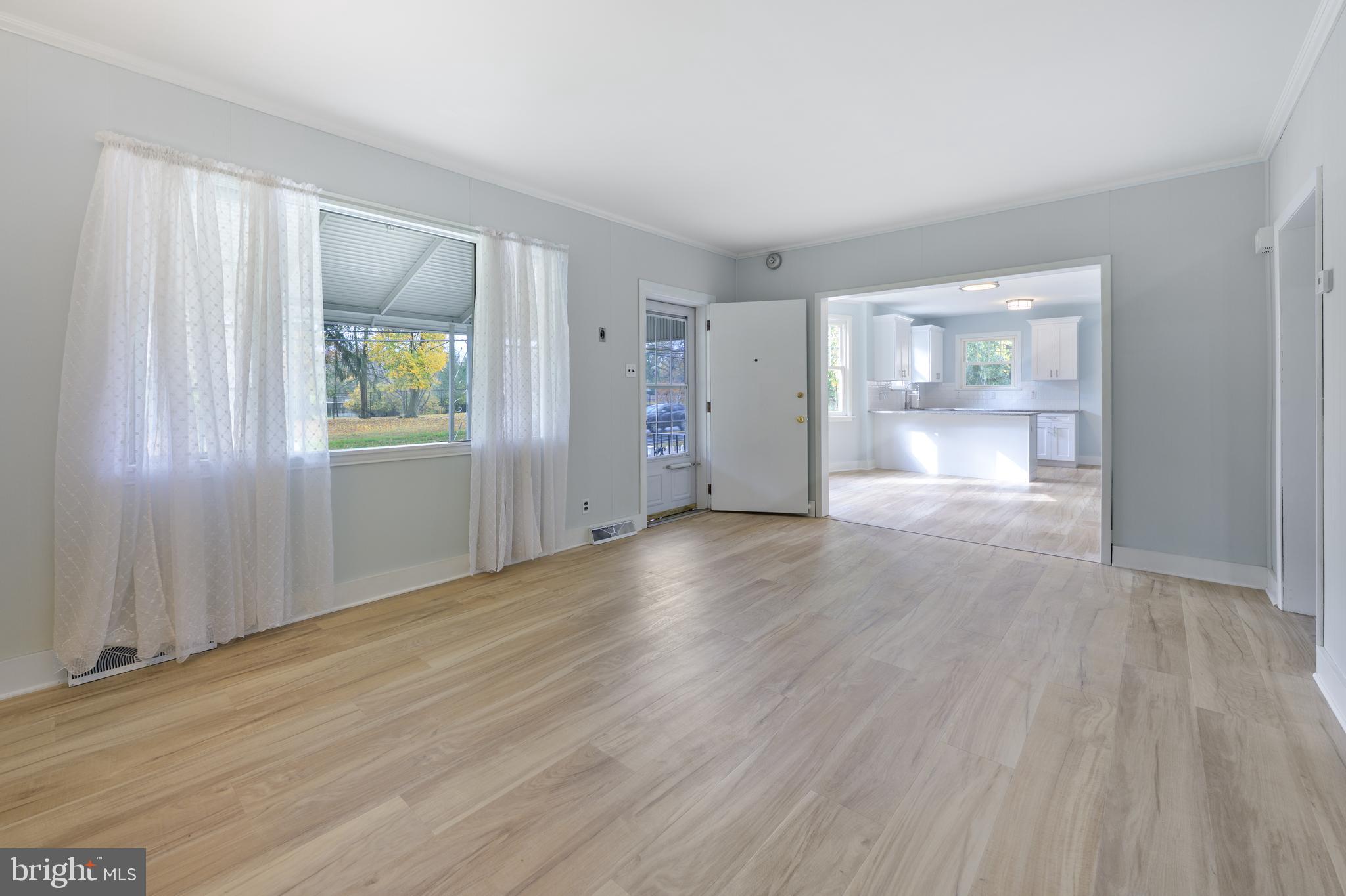 107 Hartford Road Mount Laurel, NJ 08054 - Photo 11 of 29 an empty room with wooden floor and windows