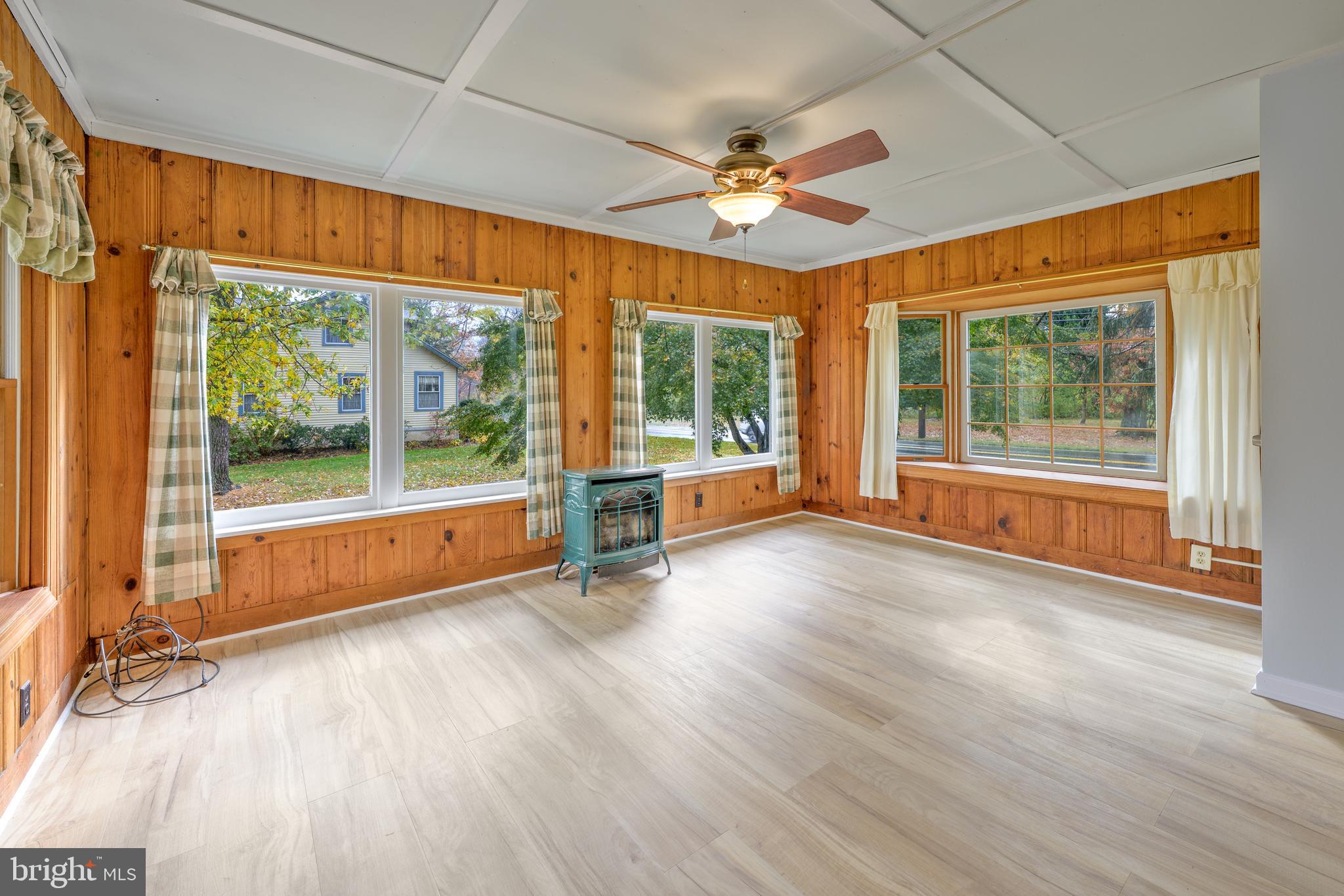 107 Hartford Road Mount Laurel, NJ 08054 - Photo 12 of 29 a view of an empty room with wooden floor and a window