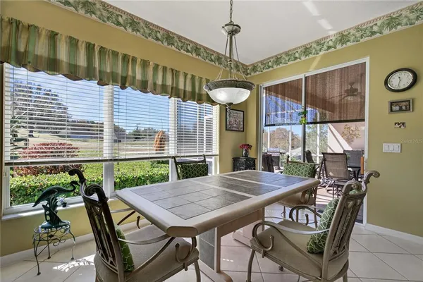 a kitchen with granite countertop a sink stainless steel appliances and cabinets
