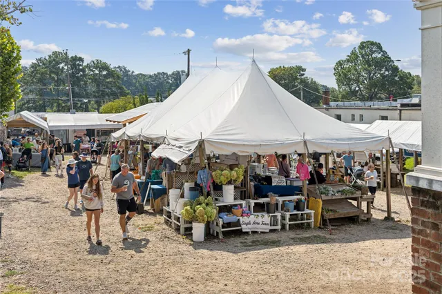 a group of people sitting outside a room