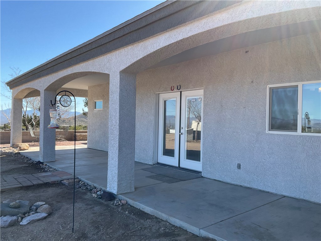 1790 Gleeson Road Golden Valley, AZ 86413 - Photo 7 of 62 View of patio / terrace featuring french doors