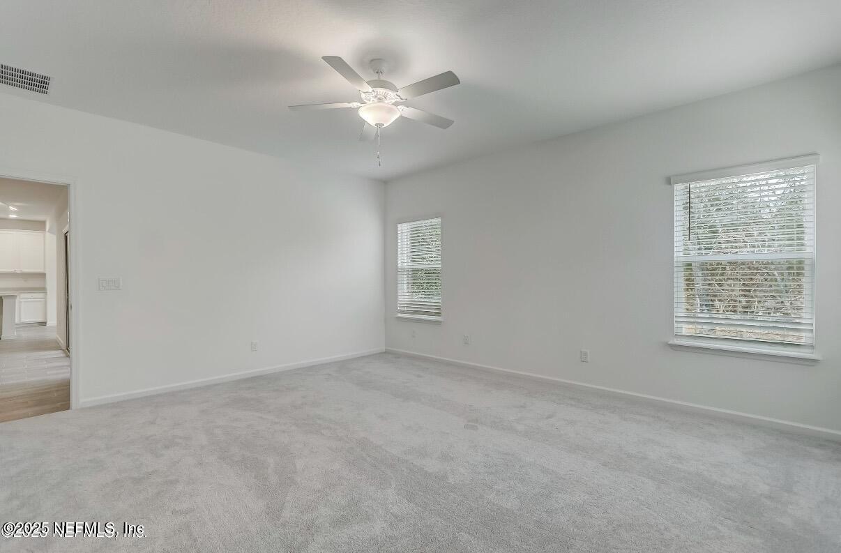 300 Gan Way St. Johns, FL 32259 - Photo 23 of 36 a view of an empty room with a window