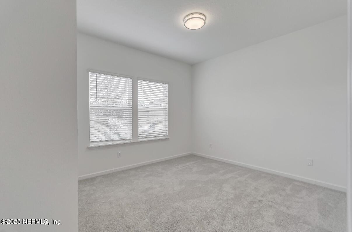 300 Gan Way St. Johns, FL 32259 - Photo 28 of 36 an empty room with a window